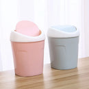 LIxeira criativa com tampa giratória de plastico.